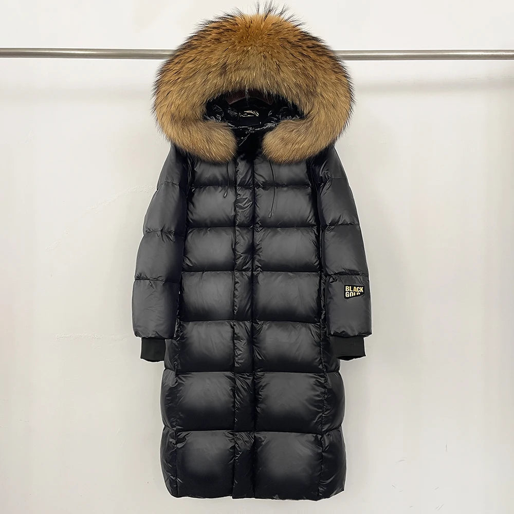 Reality Fur Over-the-Knee Puffer Jacket – Women’s Winter Coat with Raccoon Fur Hood